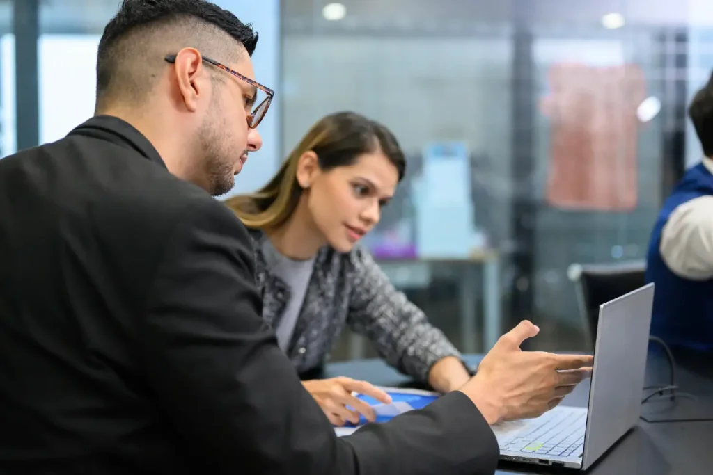Strategic IT consulting team at Realized Solutions conducting executive-level technology planning to increase business profitability.