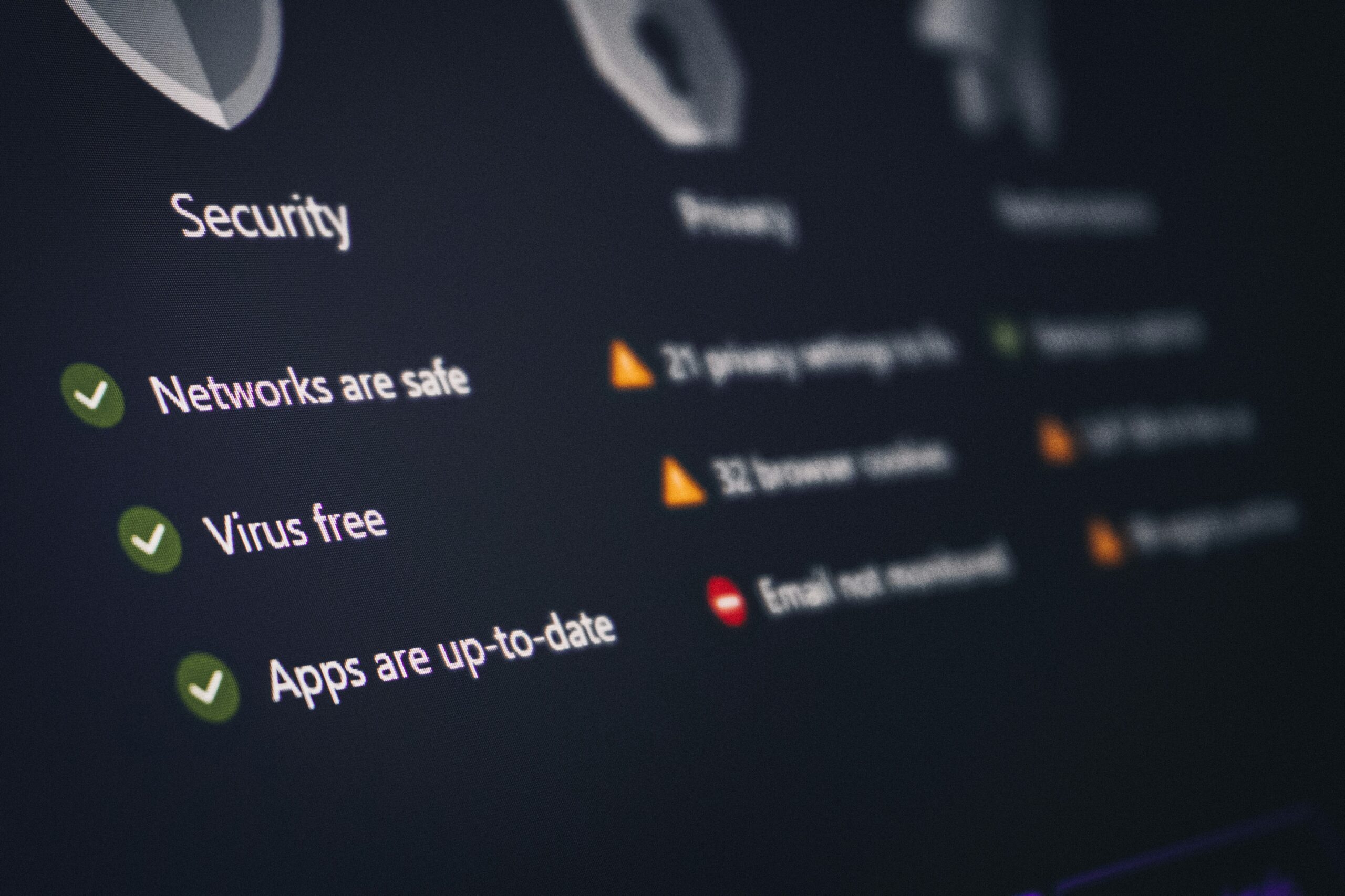 Cybersecurity dashboard displaying network security status, malware protection checks, system updates, and threat monitoring for IT infrastructure management.